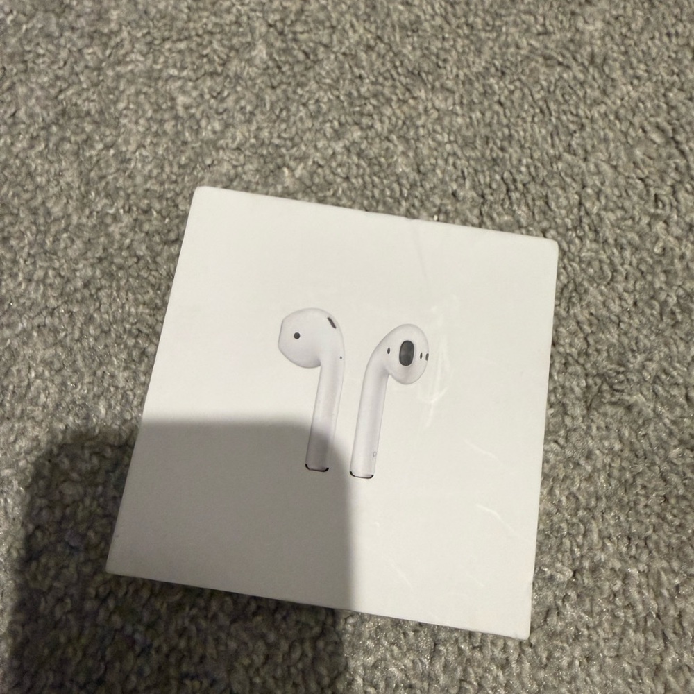 Apple AirPods with charging case Wireless Earbuds - White